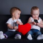 Baby-with-cellphone-e1528983290316