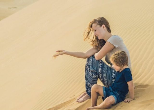 mom-son-desert_247622-2804-750x536