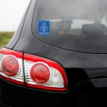 Black premium city crossover, luxury SUV rear light closeup.